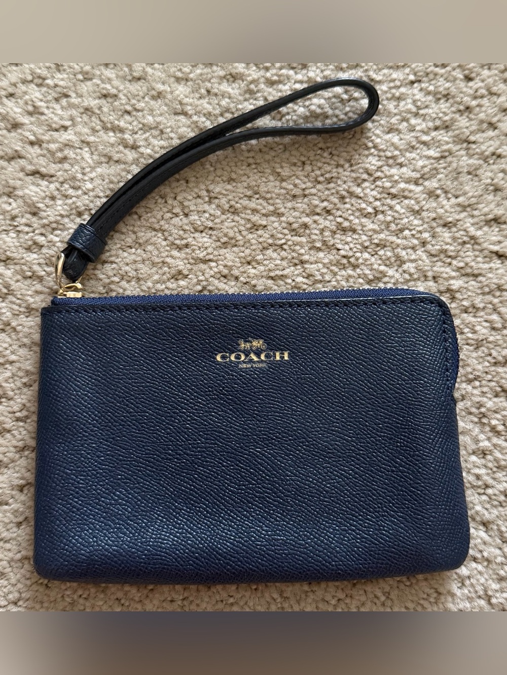 Coach Navy Pebbled Leather Wristlet with Gold Logo